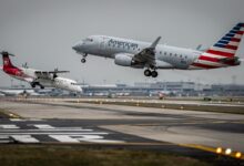 An American Airlines jet and Air Canada flight nearly collided at JFK, forcing both planes to abort landings.