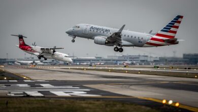 An American Airlines jet and Air Canada flight nearly collided at JFK, forcing both planes to abort landings.