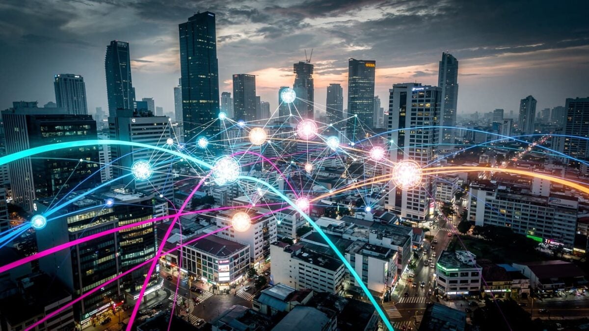 Abstract data network over Southeast Asian city skyline at dusk