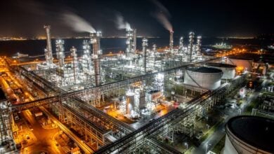 Aerial view of a petrochemical complex at night in Ulsan, South Korea