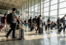 Busy airport terminal with diverse travellers in Southeast Asia
