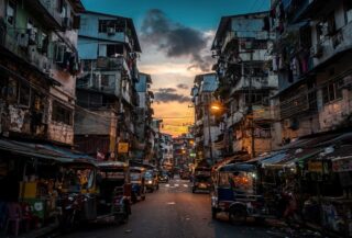 Dense residential buildings in Metro Manila, Philippines, at dusk
