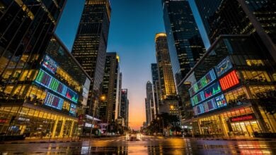 Singapore's financial district skyline at dusk, reflecting economic power