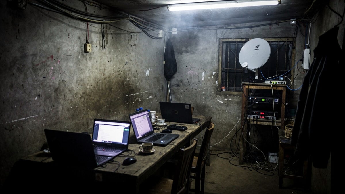 Clandestine internet café with Starlink terminal in Myanmar conflict zone