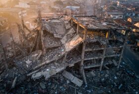 Collapsed building in Angeles City, Philippines, with twisted rebar and concrete rubble