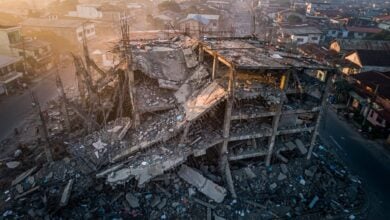Collapsed building in Angeles City, Philippines, with twisted rebar and concrete rubble