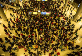 Crowded train station during Spring Festival travel rush, China