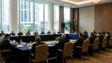 Defence ministers at formal conference, Singapore, institutional setting