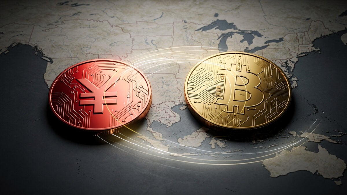 Digital yuan and Bitcoin logos over a map of East Asia and the US