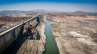 Drought-stressed hydroelectric dam with critically low water levels, Southeast Asia