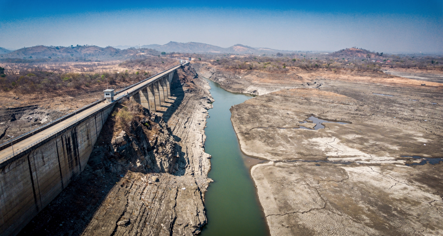 Drought-stressed hydroelectric dam with critically low water levels, Southeast Asia