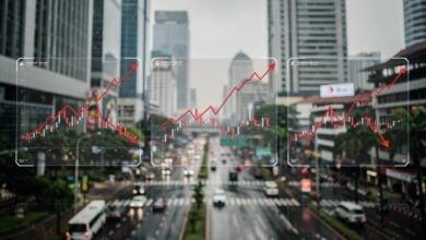 Financial charts with Jakarta financial district background
