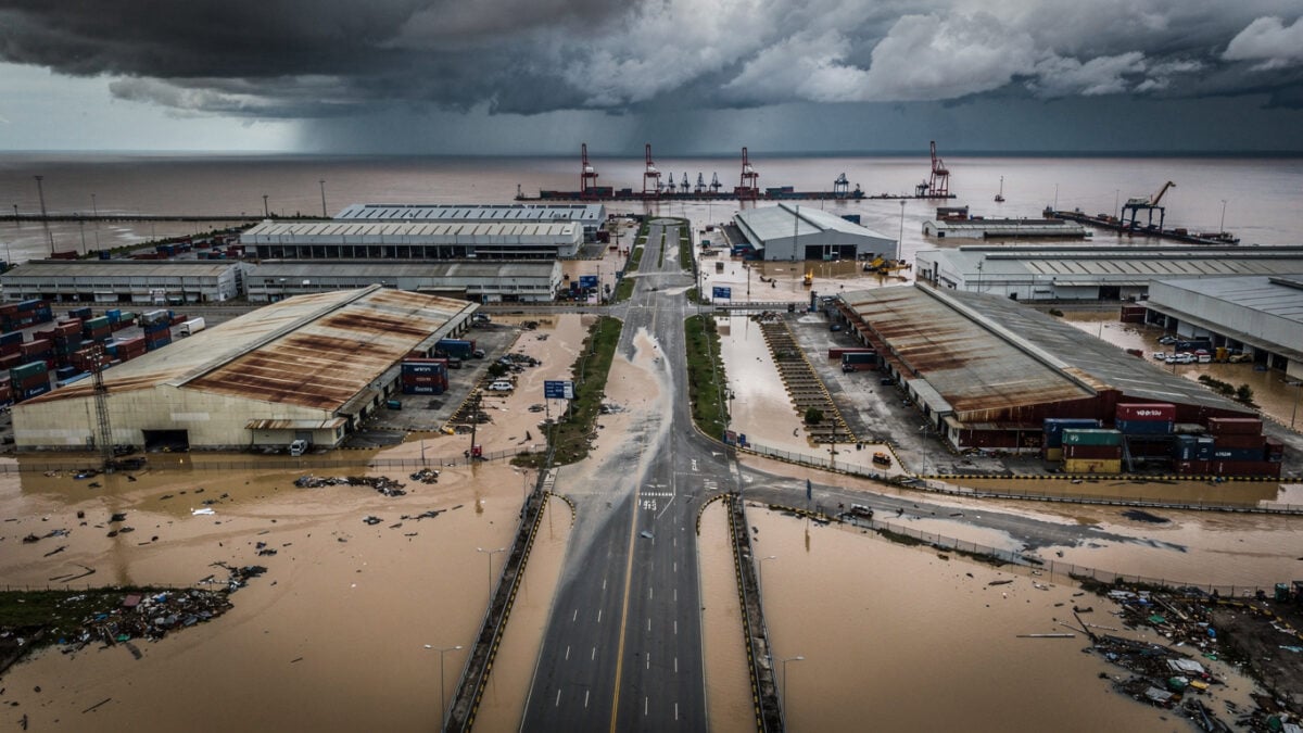 Flooded industrial area in a coastal city in Southeast Asia