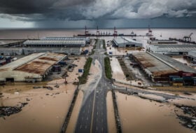 Flooded industrial area in a coastal city in Southeast Asia