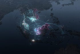 Fragmented digital networks and data streams over Southeast Asia map at night
