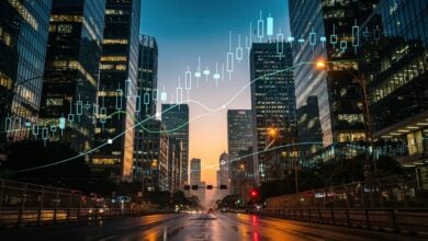 Mumbai financial district skyline with digital currency graphs at dusk