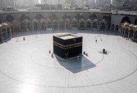 Pilgrims circling the Kaaba in Mecca under extreme heat haze