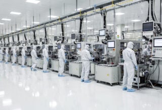 Semiconductor manufacturing facility interior, Hsinchu Taiwan, precision equipment and cleanroom workers
