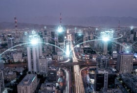 Tehran cityscape with digital network infrastructure visualization, state-controlled internet gateways