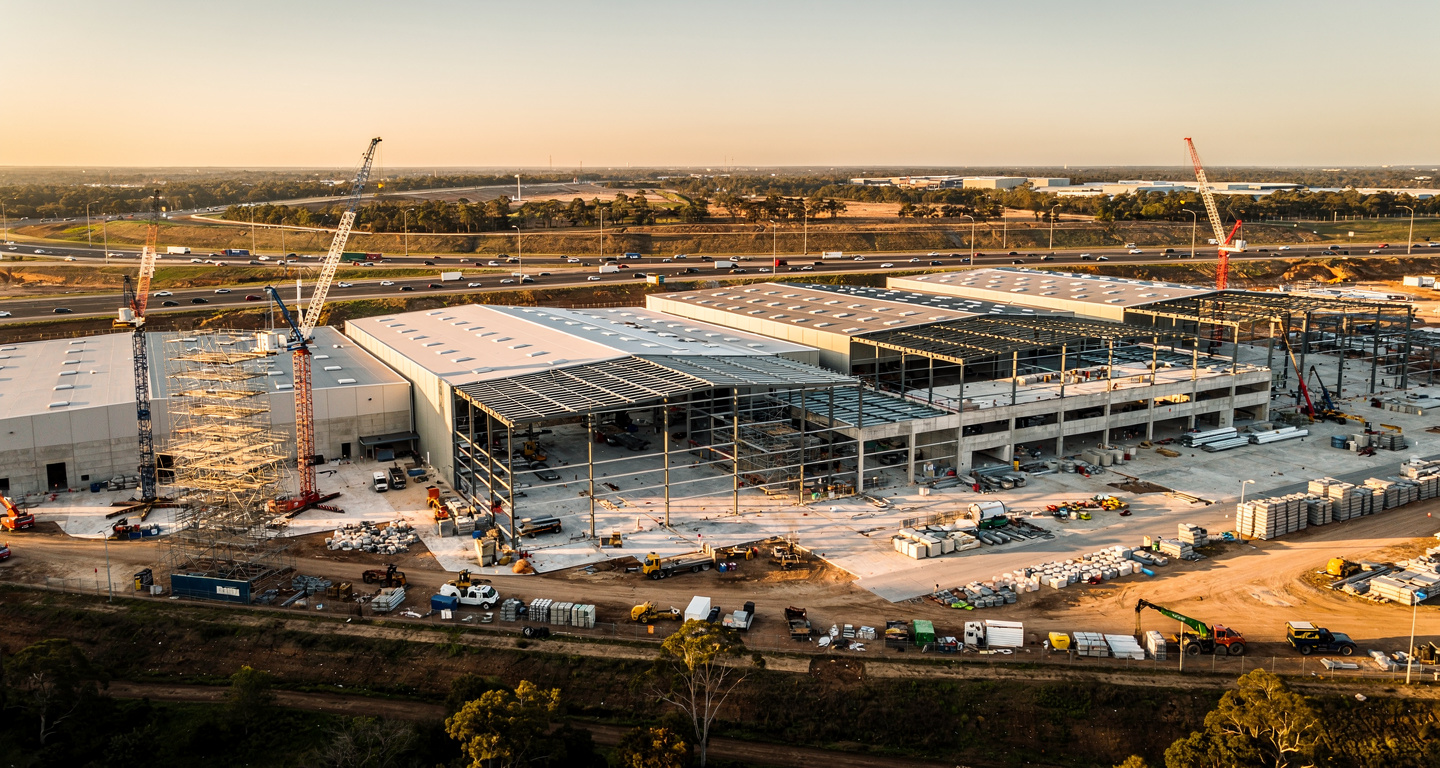 Aerial view of Western Sydney logistics estate under construction with M7 motorway in background