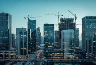 Astana financial district skyline at dusk, Kazakhstan, modern glass towers and construction
