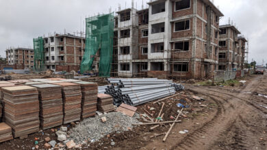 Construction materials and apartment building site in Kochi, Kerala