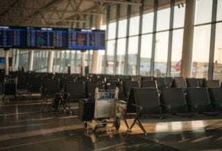 Empty departure lounge at Auckland International Airport, afternoon light