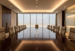 Empty diplomatic conference room in Doha with formal seating arrangement