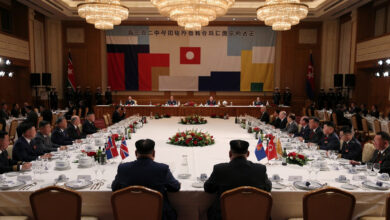 Formal state dinner setting in Pyongyang with diplomatic protocol and treaty anniversary backdrop