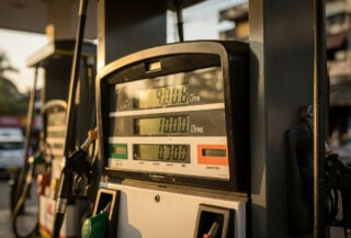 Fuel pump display showing price per litre in Sri Lankan rupees at Colombo petrol station