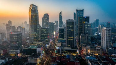 Jakarta financial district at dusk with modern banking towers and office buildings