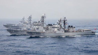 Japanese destroyer in formation with allied naval vessels, South China Sea