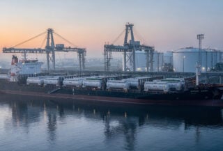 LPG tanker containers at US Gulf Coast port terminal, industrial shipping infrastructure