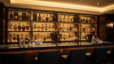 Premium whisky bottles displayed in Tokyo bar, American and Japanese spirits side by side
