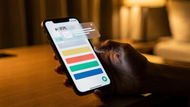 Smartphone showing hotel booking confirmation with email notification overlay
