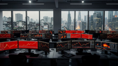 Trading floor with red market data displays, Mumbai and Taipei skylines visible