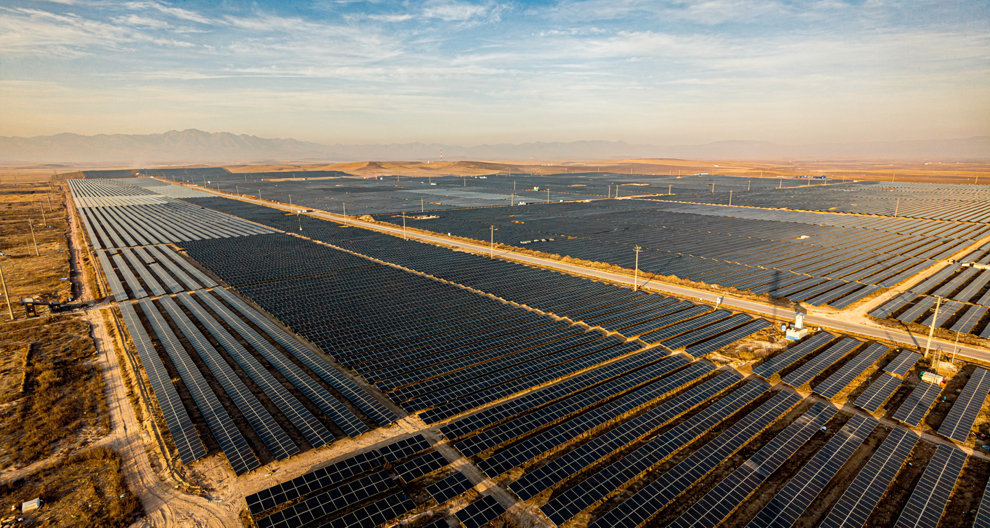 Vast solar panel array in northern China under afternoon light