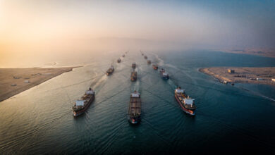 Aerial view of oil tankers transiting the Strait of Hormuz at dawn