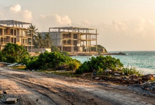 Beachfront resort under construction in Phu Quoc, Vietnam with unpaved access road
