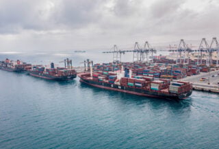 Container ships at port terminal in Salalah, Oman, aerial view