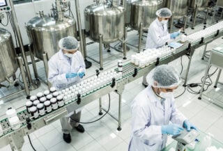 Cosmetics manufacturing facility in Jakarta with quality control inspection