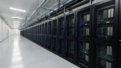 Data center interior with GPU server racks and industrial cooling infrastructure, Japan