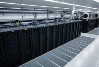 Data centre server facility with industrial cooling systems and overhead lighting