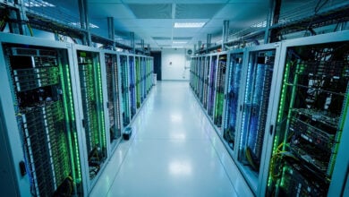 GPU server clusters in Southeast Asian data center, blue-lit computing infrastructure