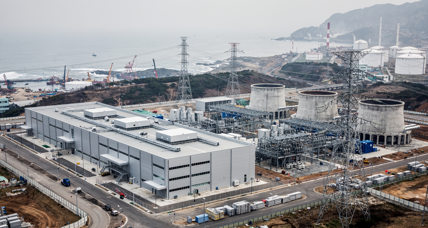 Industrial data center construction site in Ulsan, South Korea, with cooling infrastructure and power systems