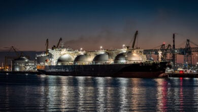 LNG tanker at industrial port terminal, Texas Gulf Coast at dusk