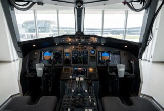 Modern aircraft cockpit simulator in Singapore aviation training academy