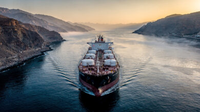 Oil tanker in Strait of Hormuz waterway, Iran-Oman passage, dawn light