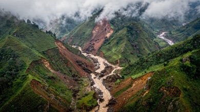Saturated mountain slopes in Lai Chau province, northern Vietnam, showing landslide damage and debris flows