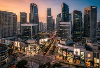 Singapore skyline with Orchard Road retail and prime office towers at dusk